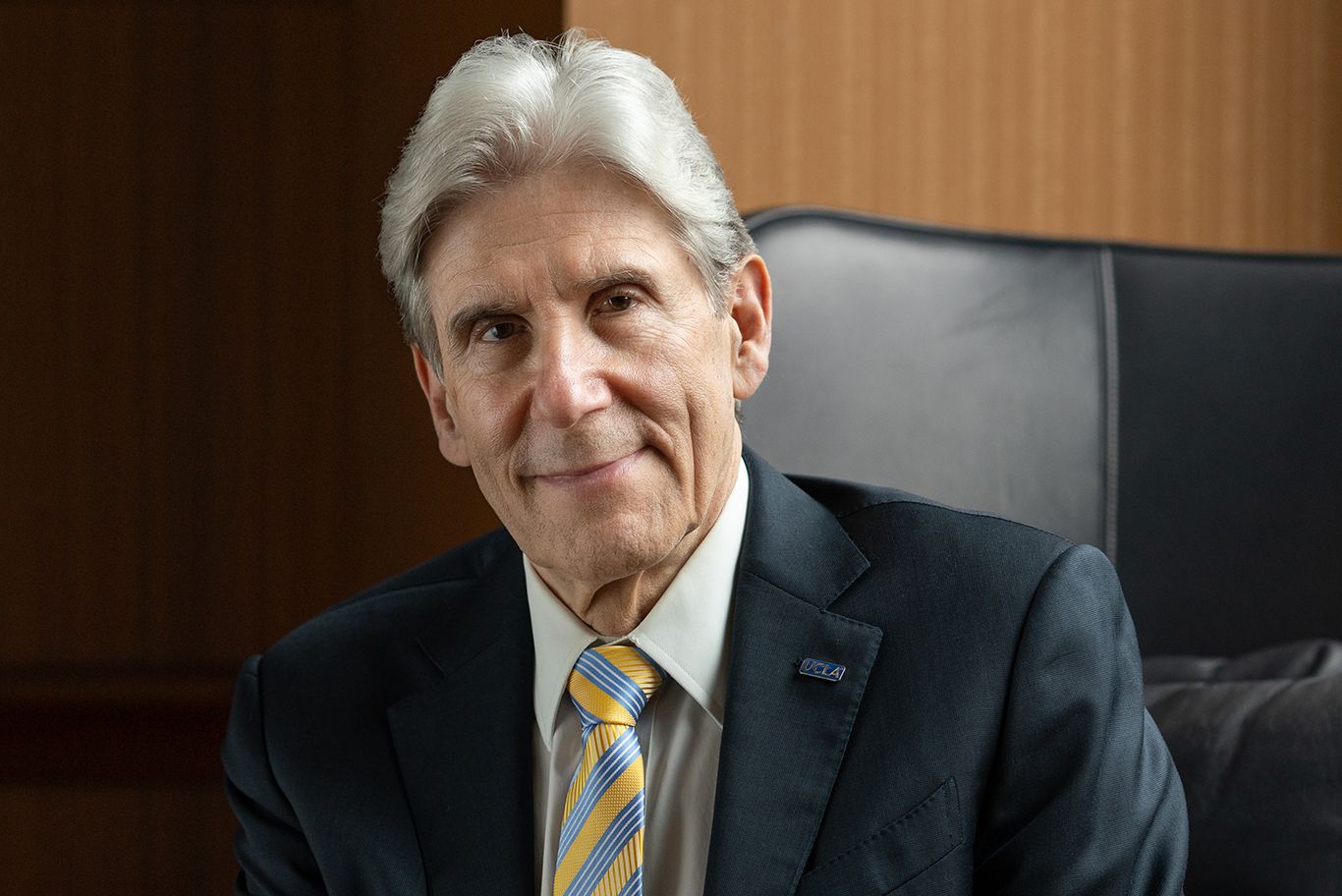 Head-and-shoulders photo of Julio Frenk in charcoal-gray jacket and blue-and-gold tie