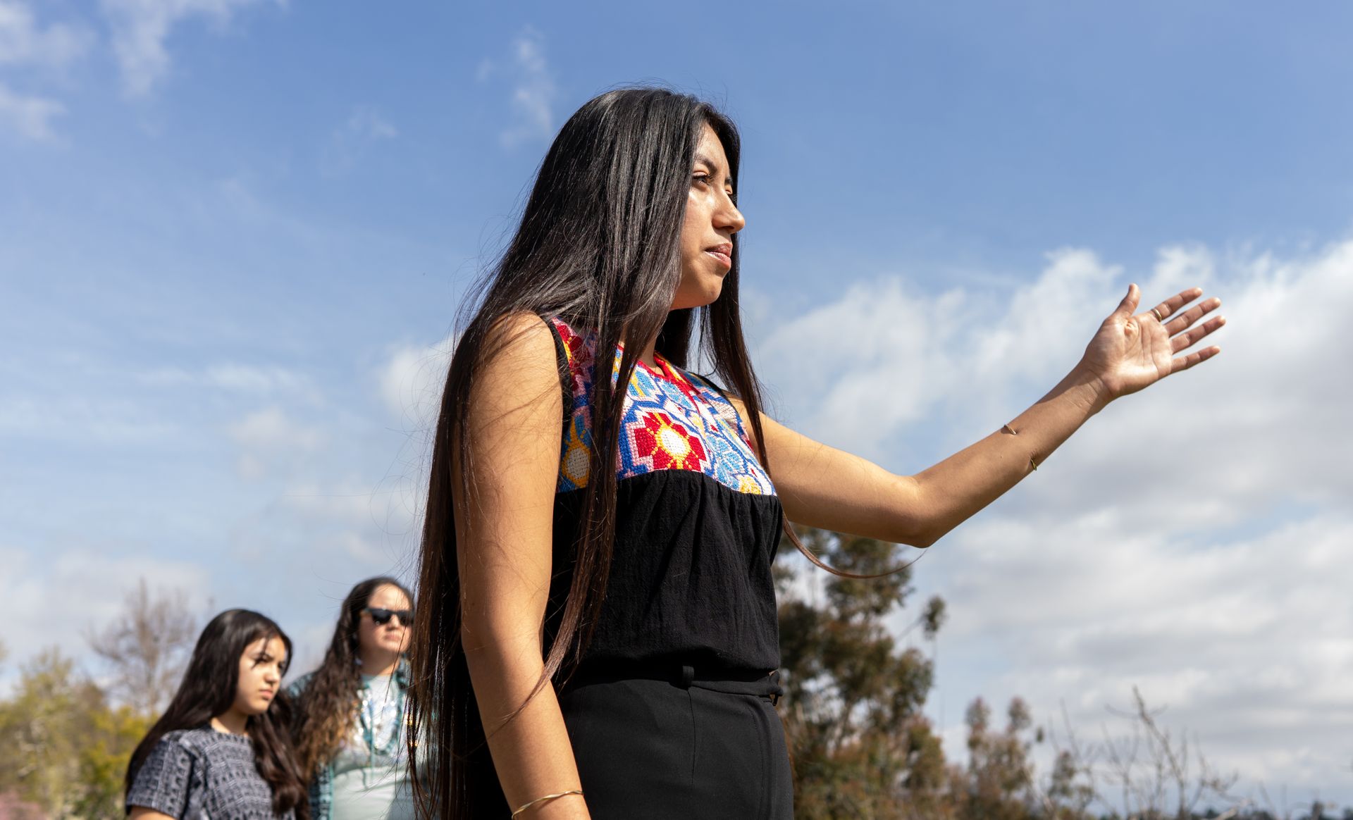 Ary Amaya scans the hilltop at the the Chief Ya’anna Regenerative Learning Village.