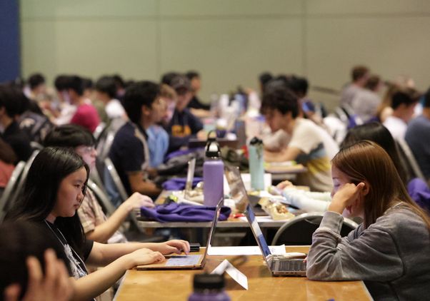 Students with laptops participating in DataFest