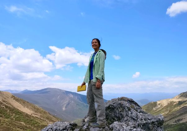 Abijah Simon standing on mountain