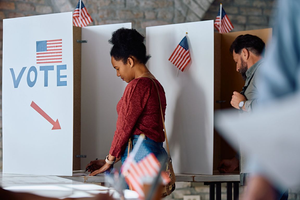 Voters at voting booths