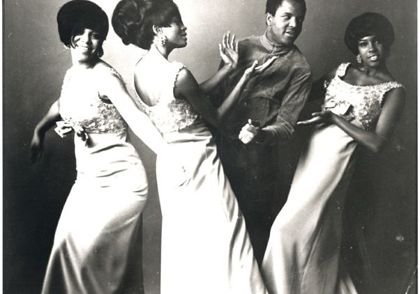 Black-and-white promotional photo of Berry Gordy with the Supremes