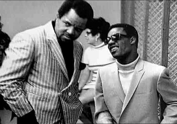 Black-and-white photo of Berry Gordy with Stevie Wonder
