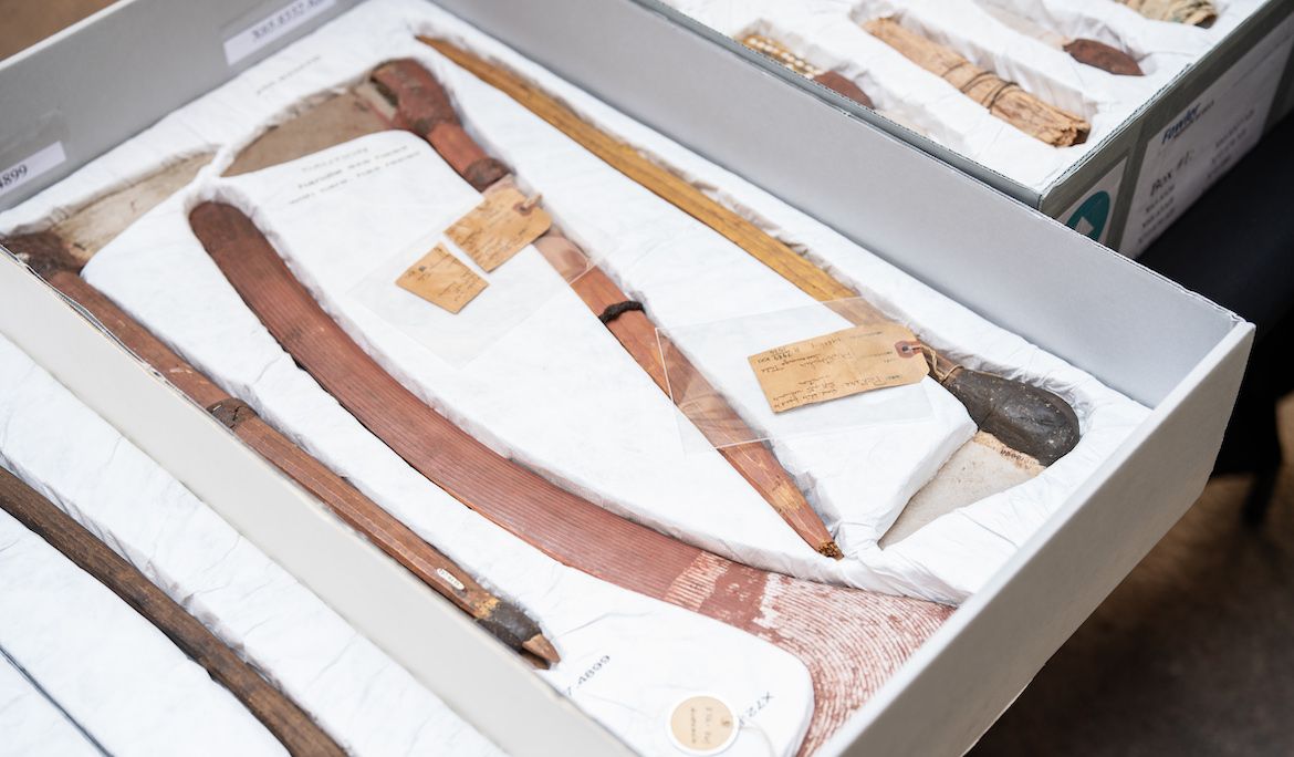 Picks, adzes and boomerang in display box