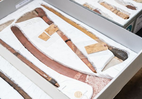 Picks, adzes and boomerang in display box
