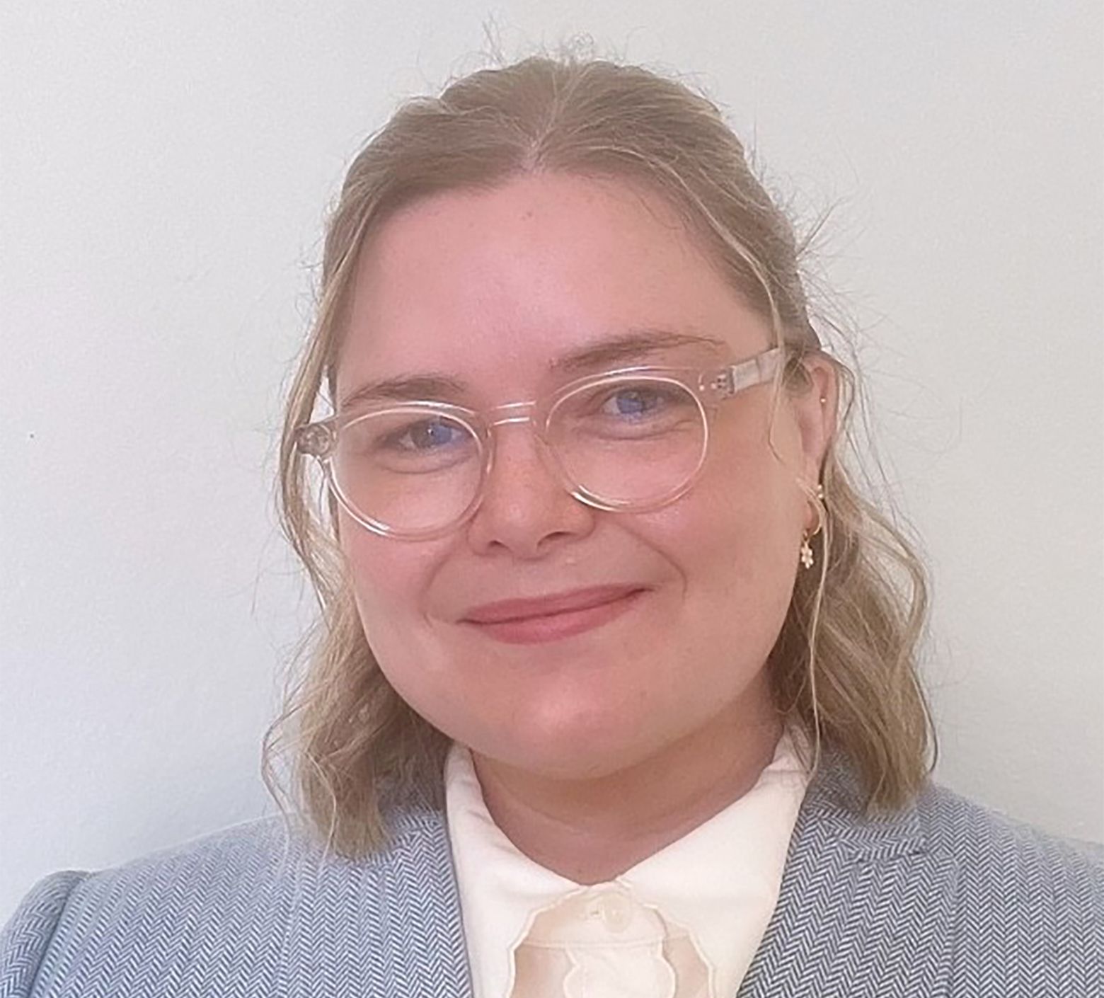 Ruby Sims with glasses