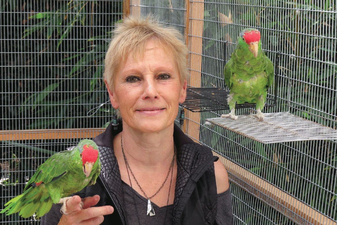 Ursula Heise with parrots