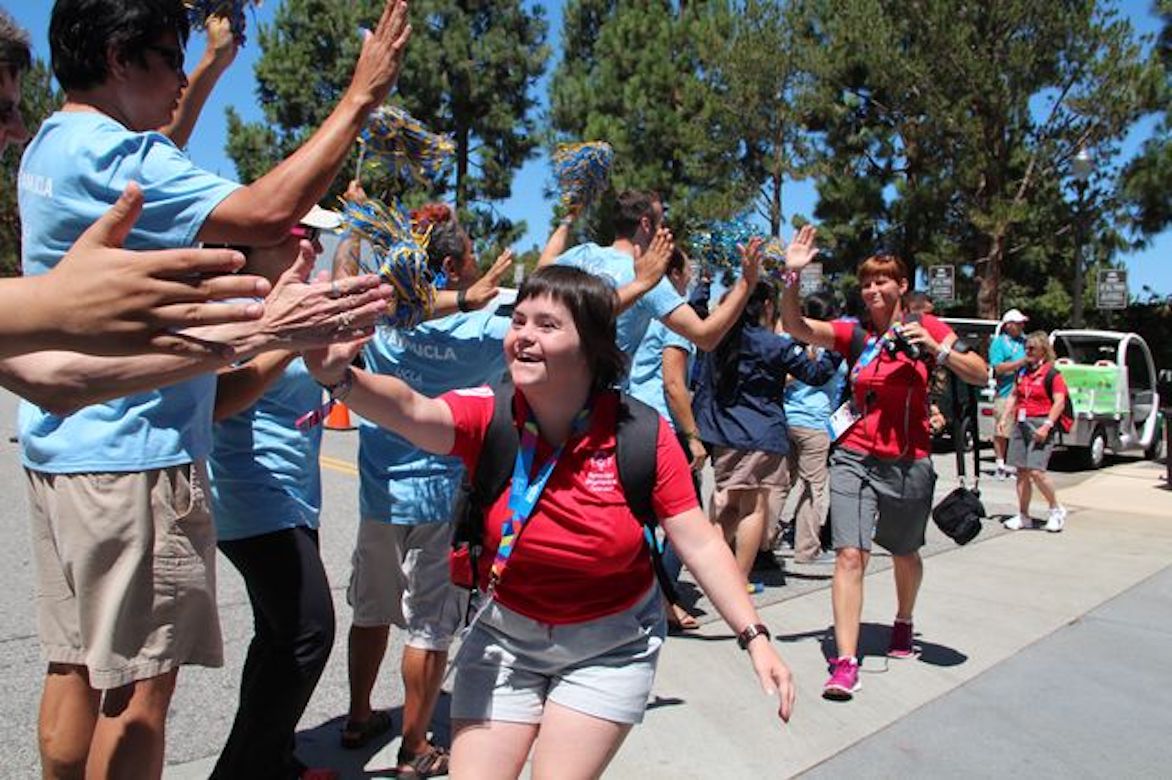 Greeting competitors at Special Olympics at UCLA