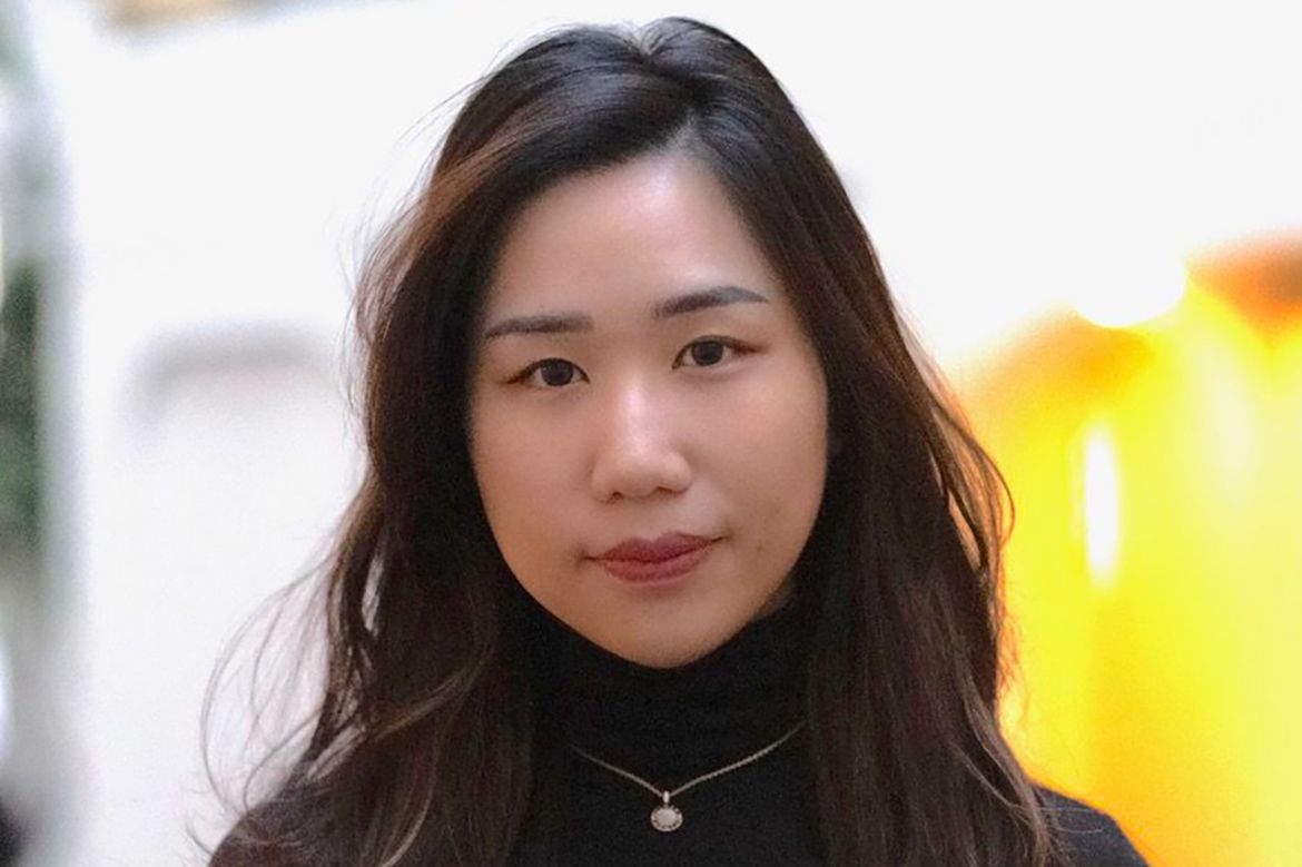 Yi-Ting Lu wearing black turtleneck and silver pendant