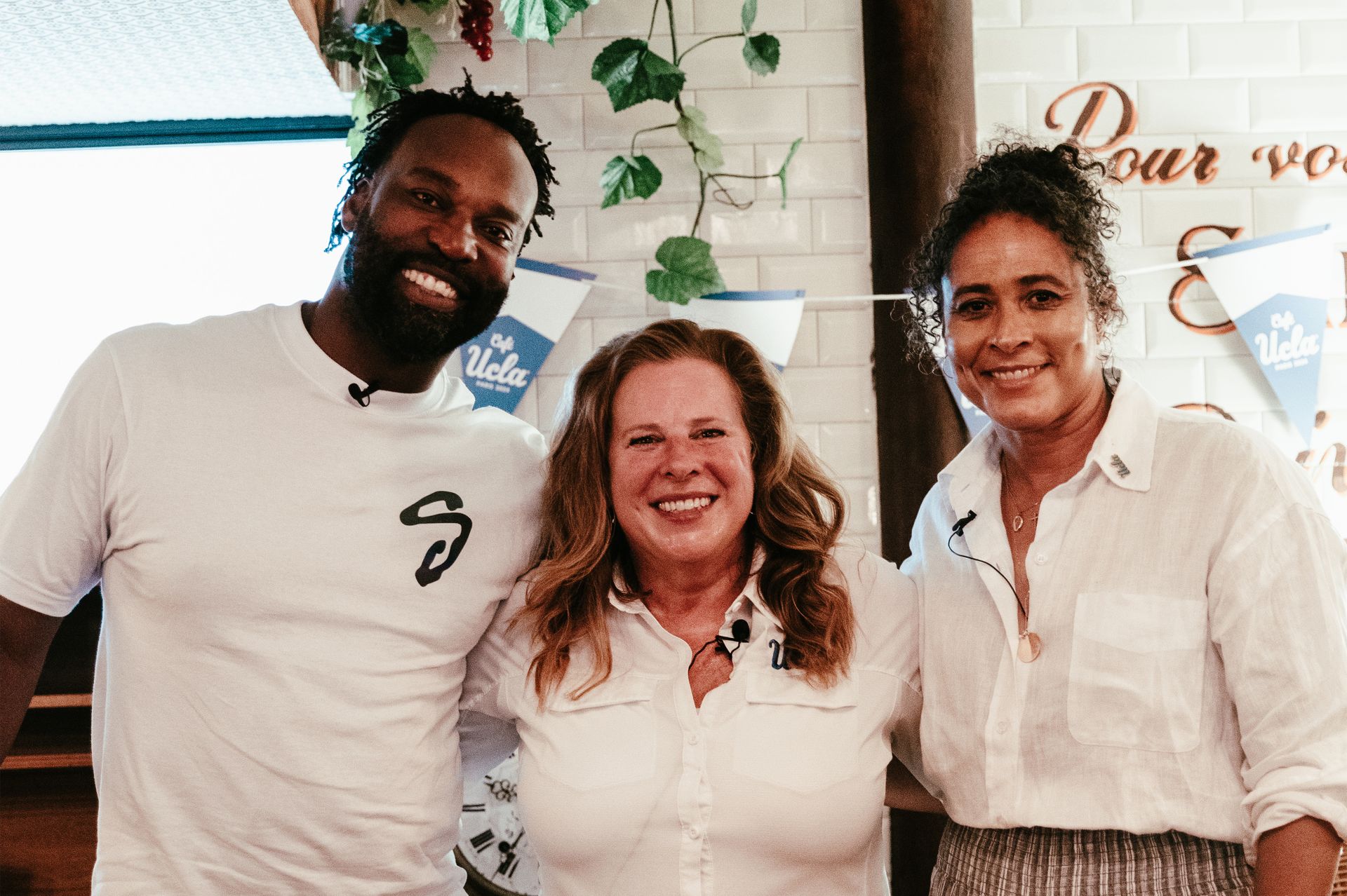 From left to right: Baron Davis, Cori Close and Jenny Johnson Jordan stand together