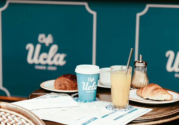 Table with crossants, beverages and Café UCLA cup