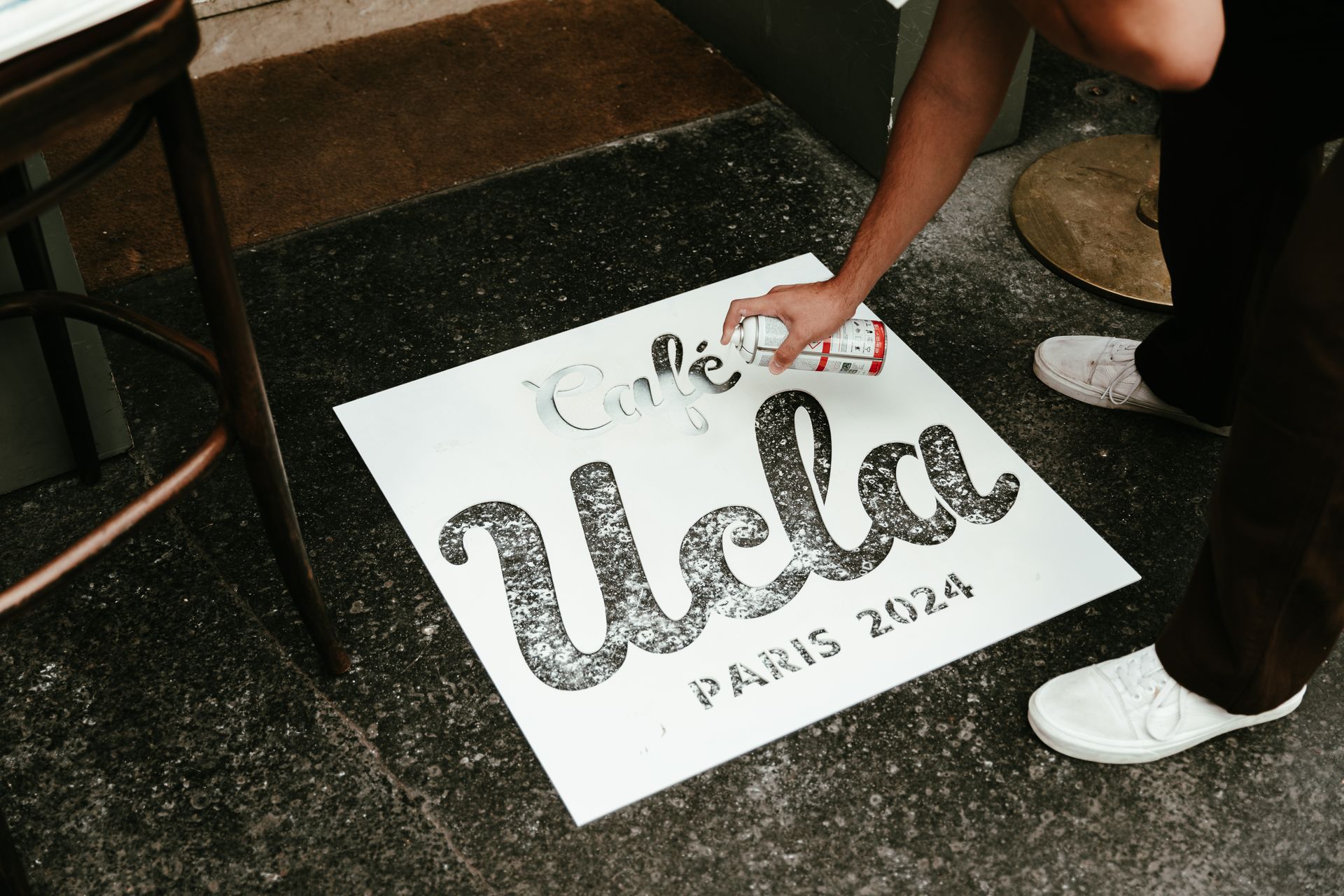 Café UCLA Paris 2024 stencil on ground