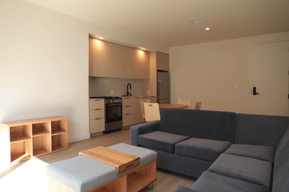 Photo | Interior of unit at Canfield Apartments showing living area | UCLA