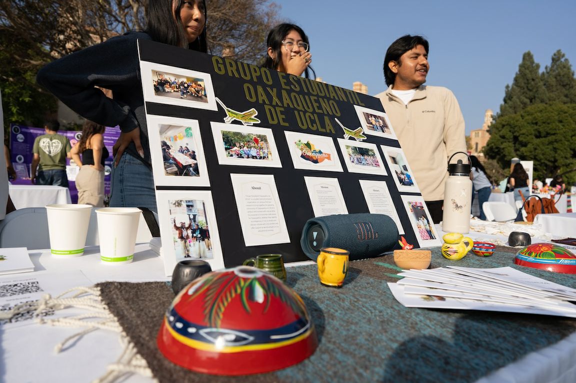 Students representing Grupo Estudiantil Oaxaqueño de UCLA tabling at the 2024 Latinx Welcome event. 