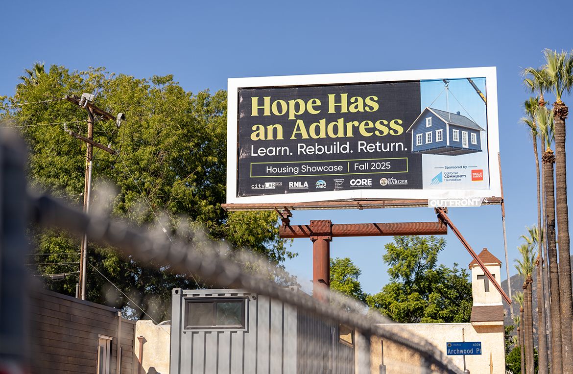 A billboard near Archwood Place in Altadena, California reads "Hope Has an Address — Learn. Rebuild. Return." and advertises a Housing Showcase in Fall 2025.