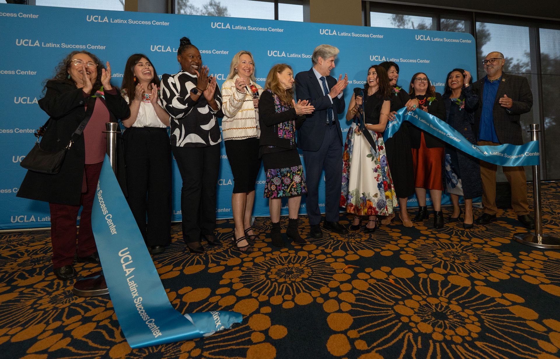 A ribbon cutting ceremony at the opening of the Latinx Success Center