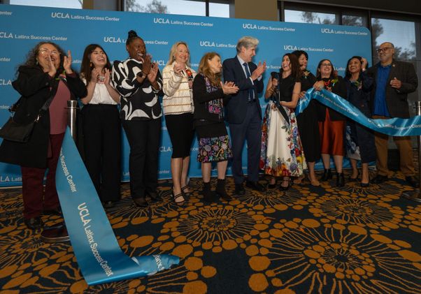 A ribbon cutting ceremony at the opening of the Latinx Success Center