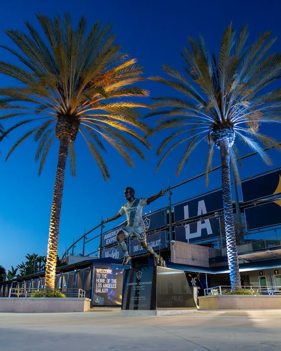 Entrance to Dignity Health Sports lit up in blue
