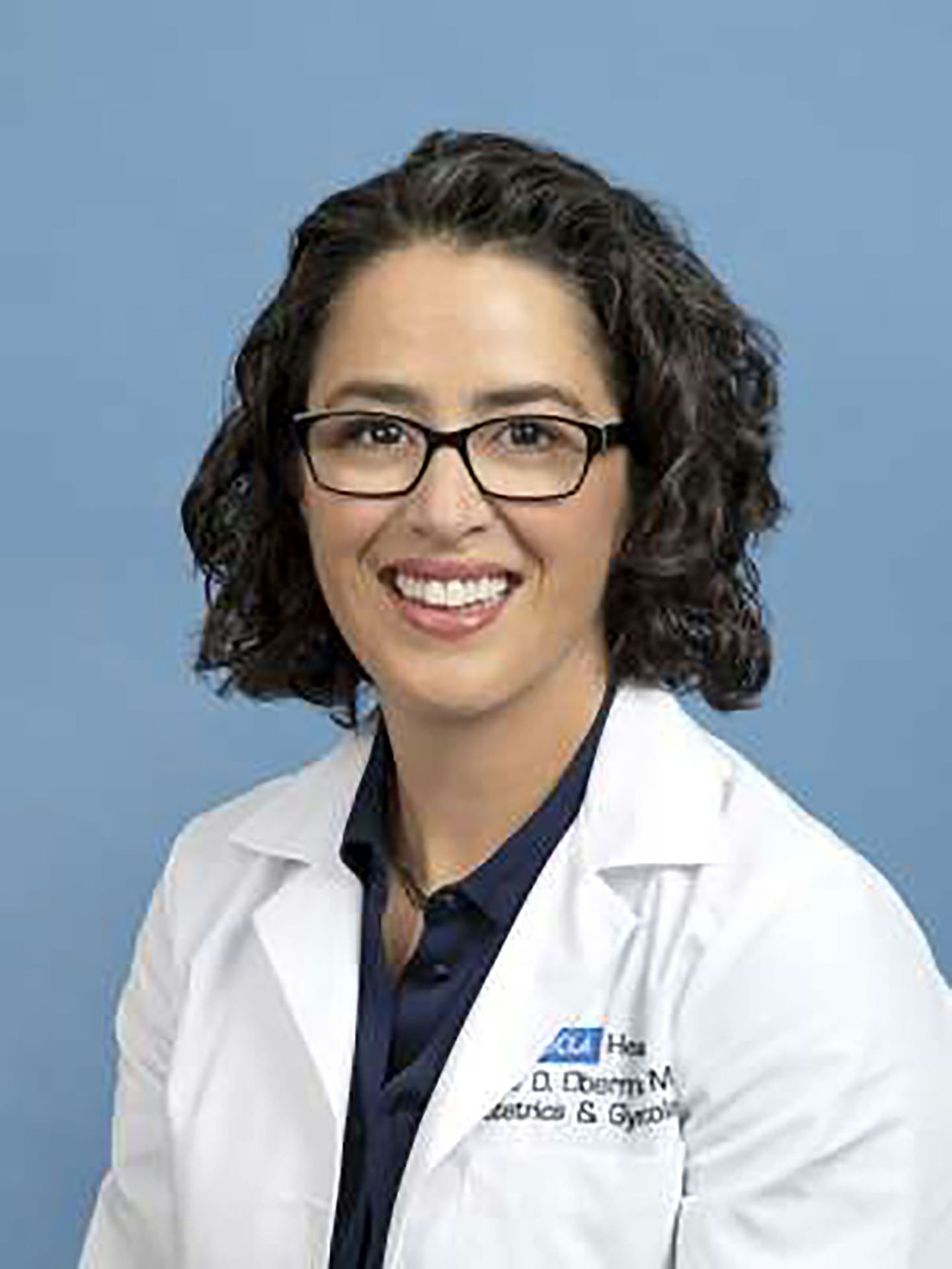 Erica Oberman in white coat