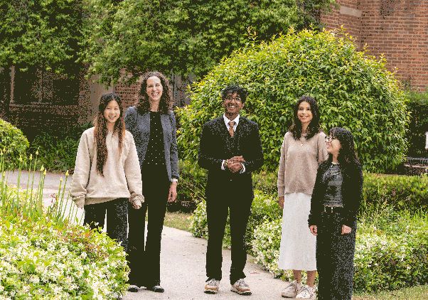 Sophia Zhao (left) and members of the student club (Re)Defining Health with Professor Whitney Arnold.