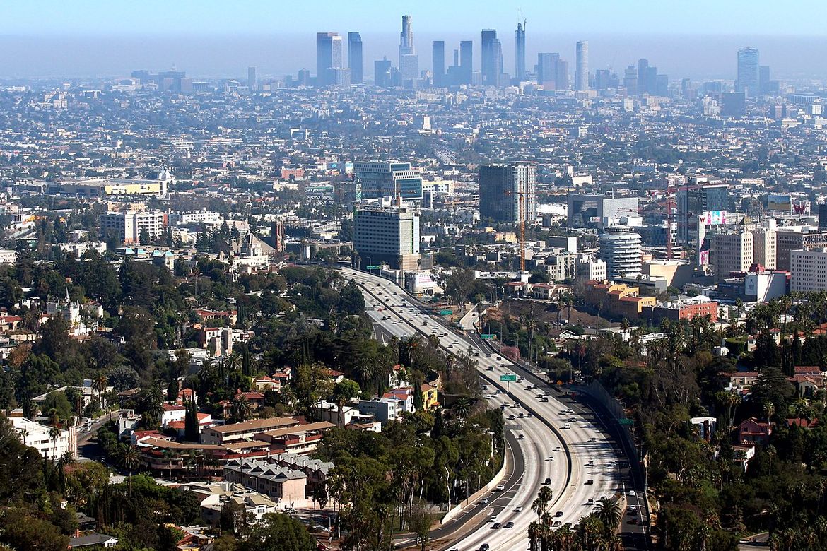 Hollywood Freeway with smoggy Los Angeles skyline on horizon