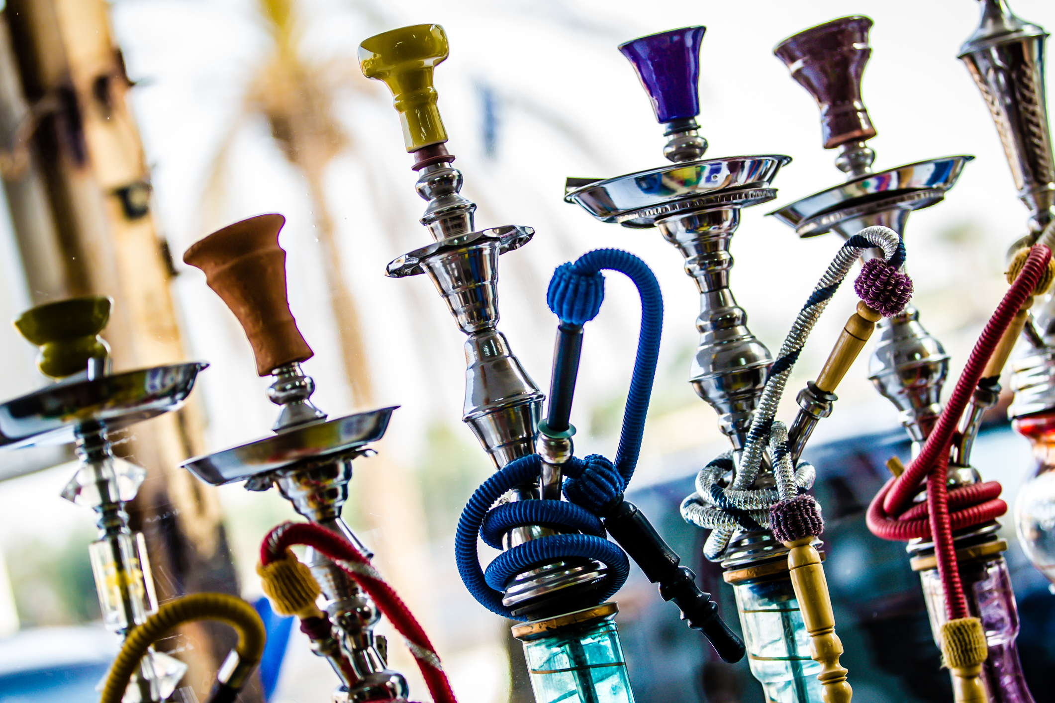 Lineup of four multicolored hookahs