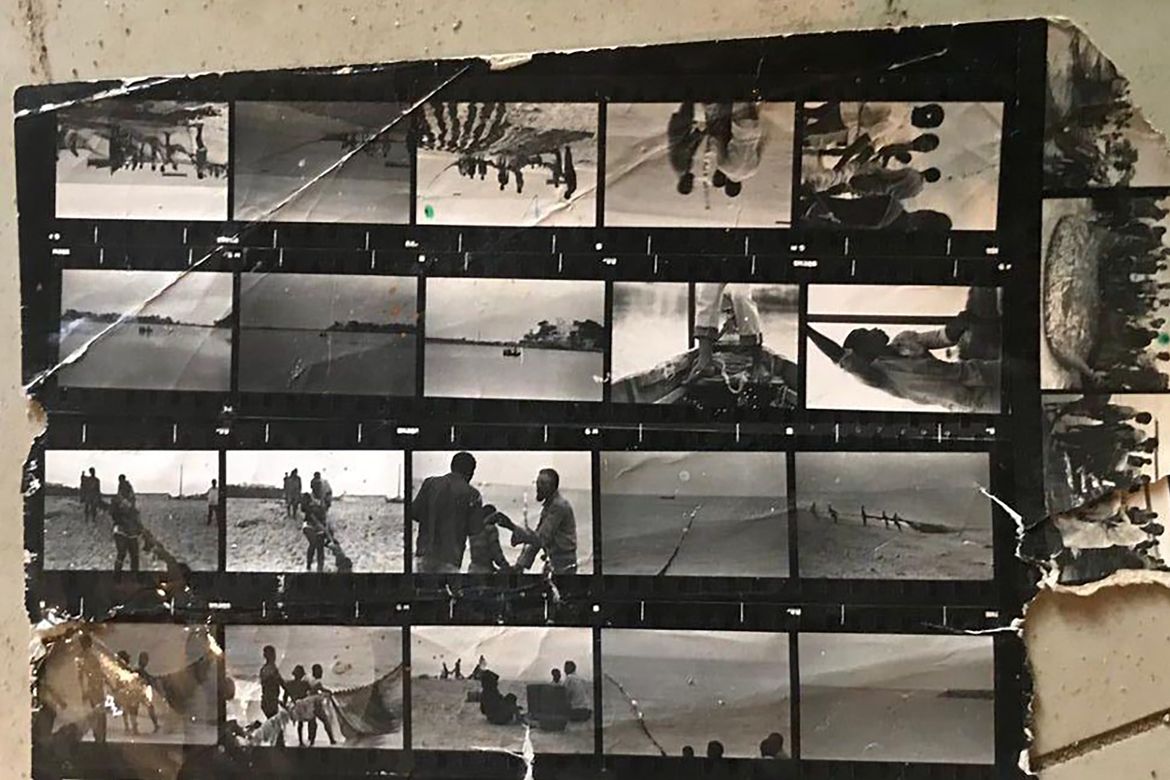 Contact sheet of black-and-white photographs showing people at a beach