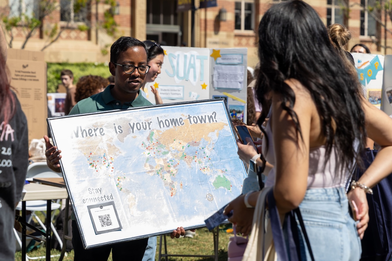 Activities Fair-Student with poster-hometown