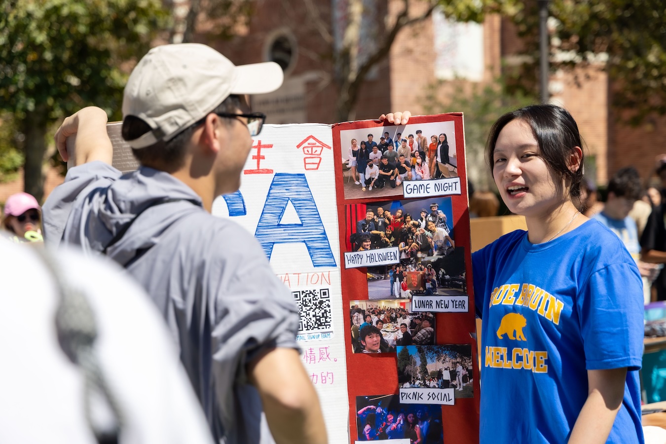 Activities Fair-Student with poster