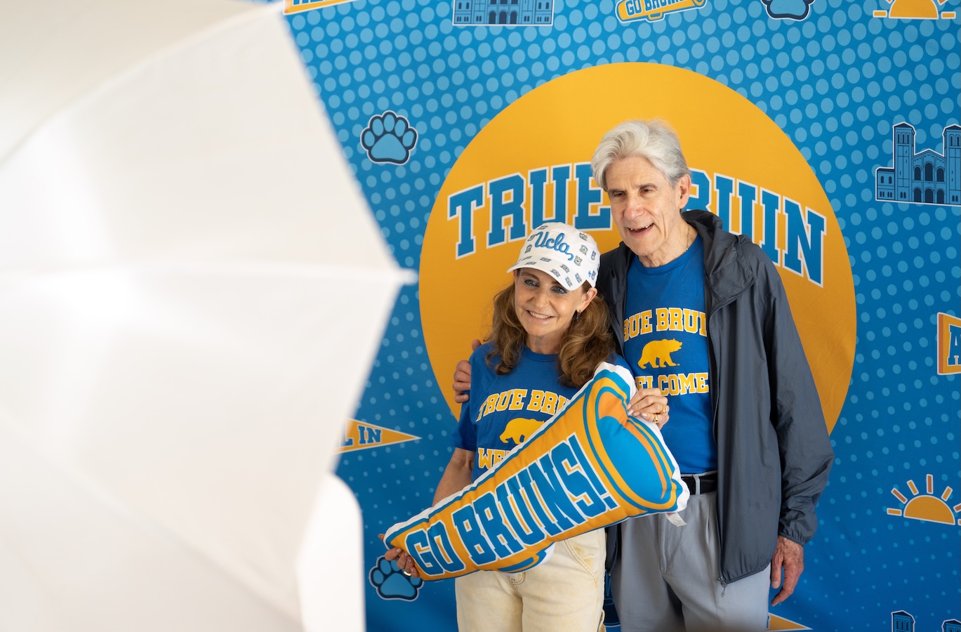 Move-inFrenk Knaul in front of True Bruin sign