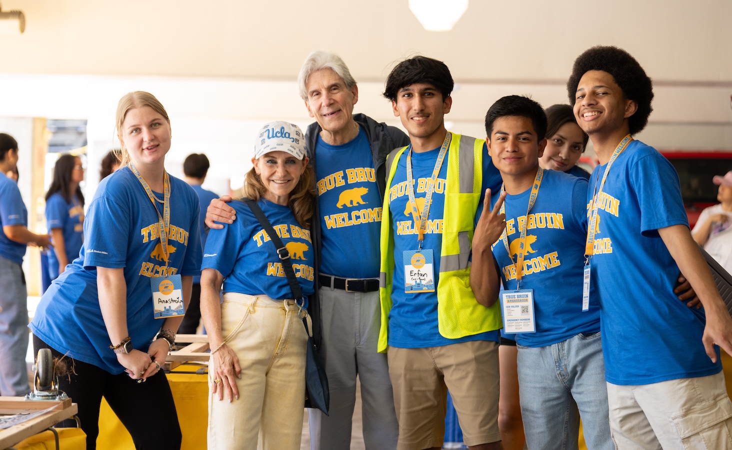 Move-inFrenk Knaul pose with 4 True Bruin Ambassadors