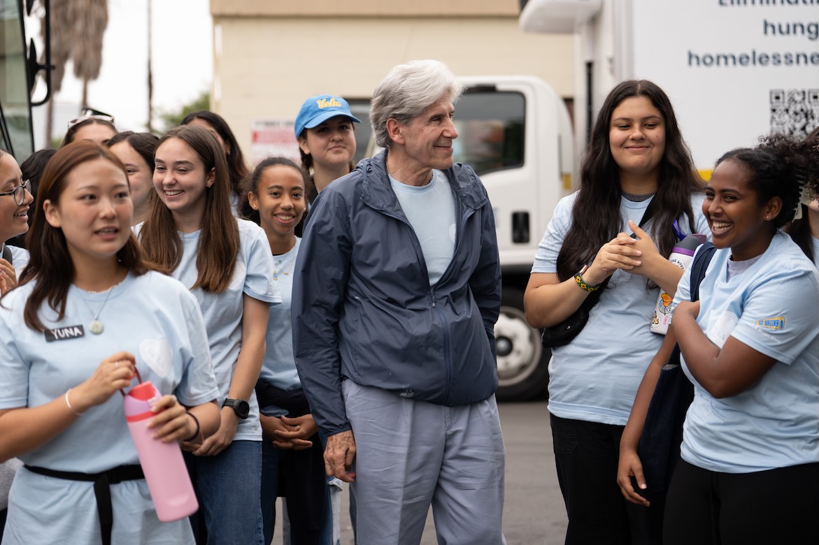 VolunteerFrenk with students at Hope the Mission