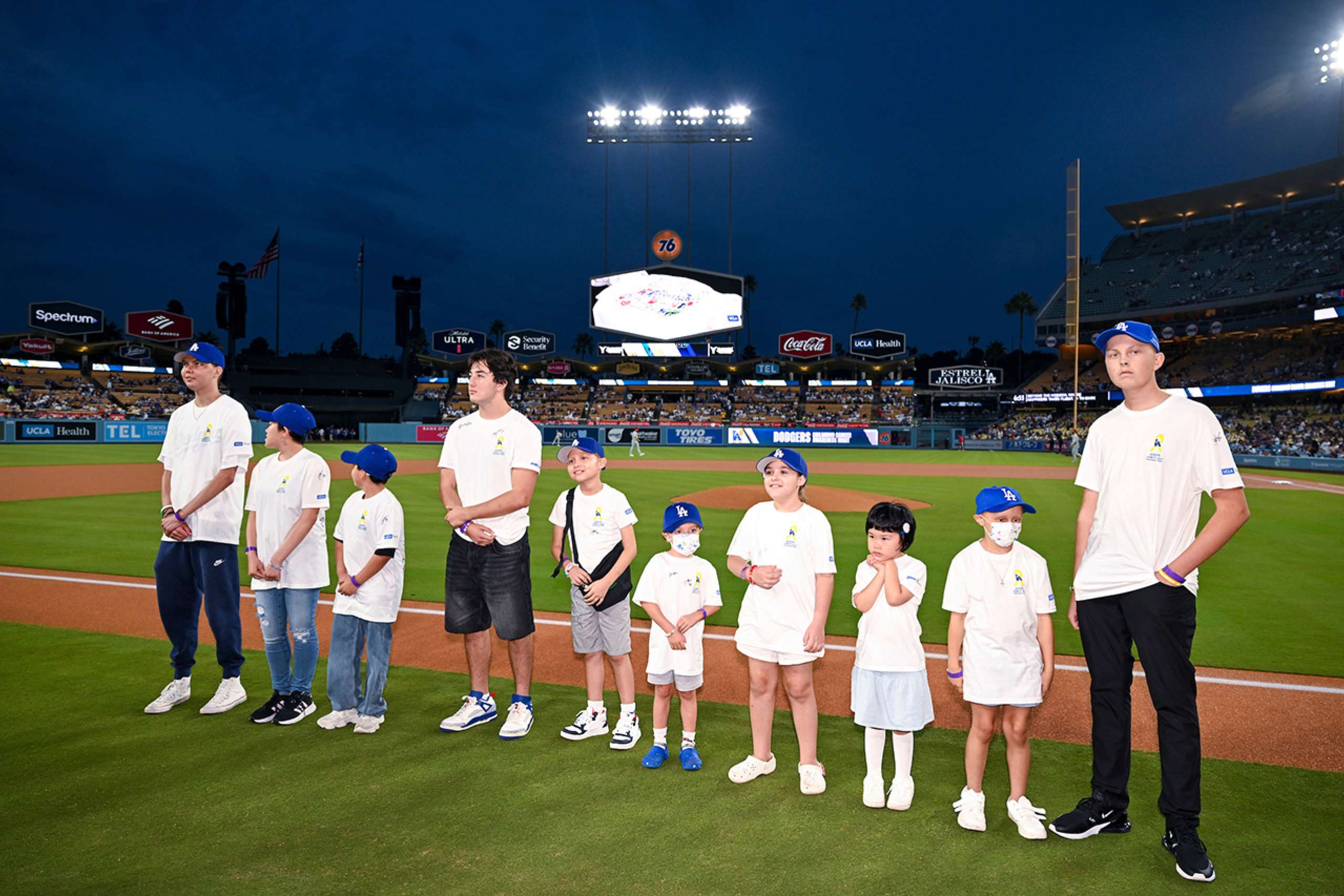 Childhood Cancer Awareness Night honorees are introduced to the fans at Dodger Stadium.