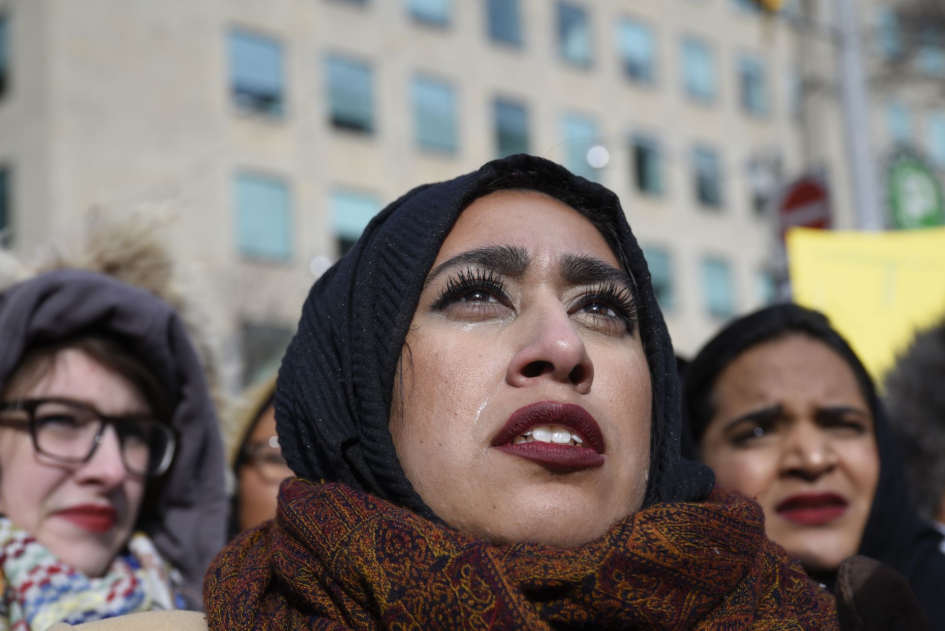 Close-up of woman with tears running down her face