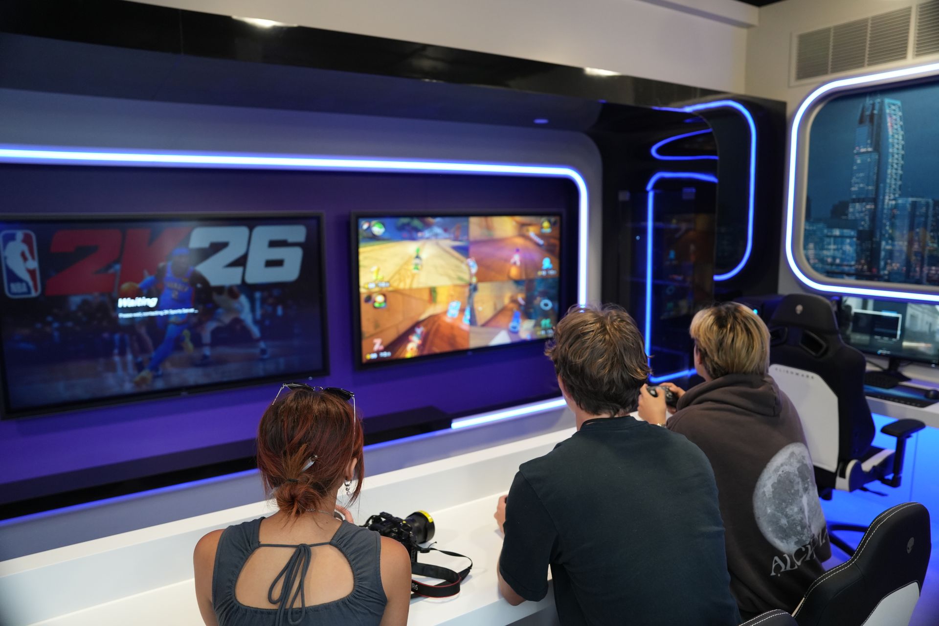 Students play games at the grand opening of the Esports lounge in Akerman