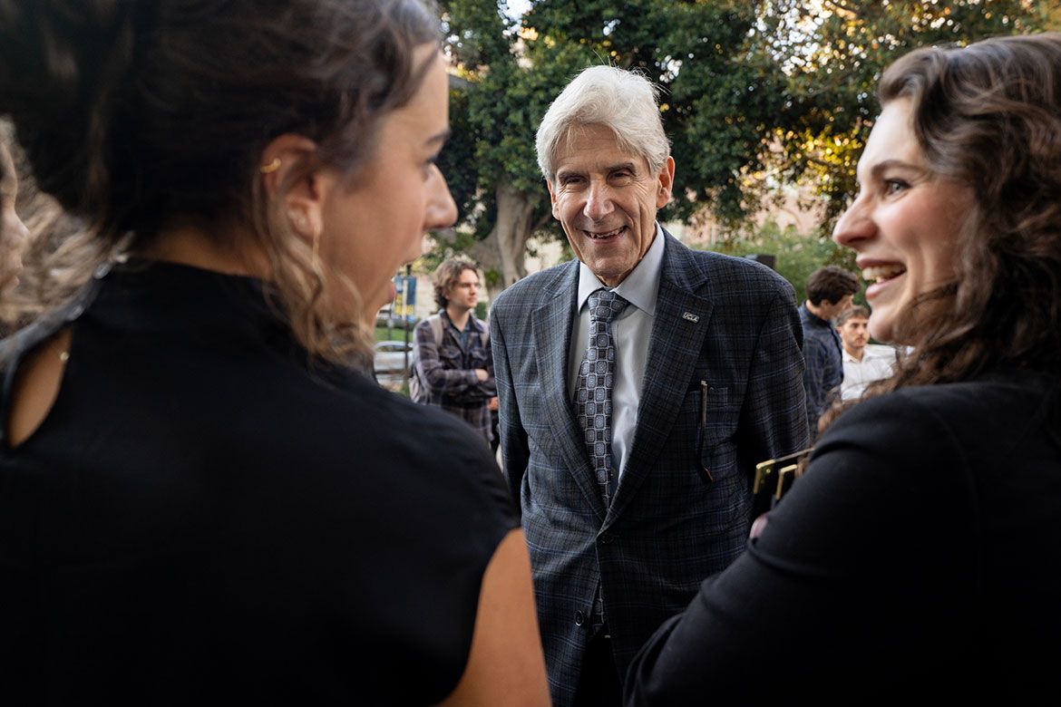 Chancellor Julio Frenk speaks with members of the Bruin community