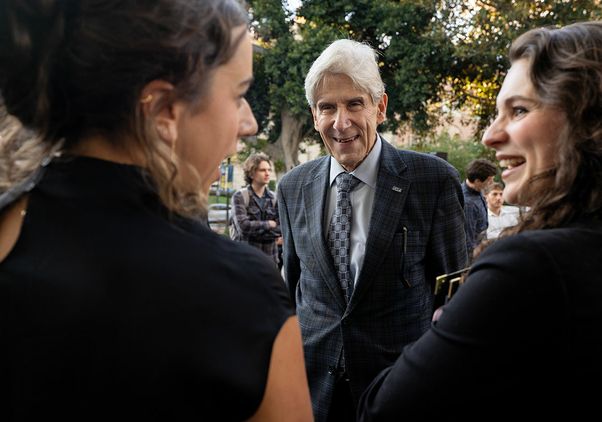Chancellor Julio Frenk speaks with members of the Bruin community