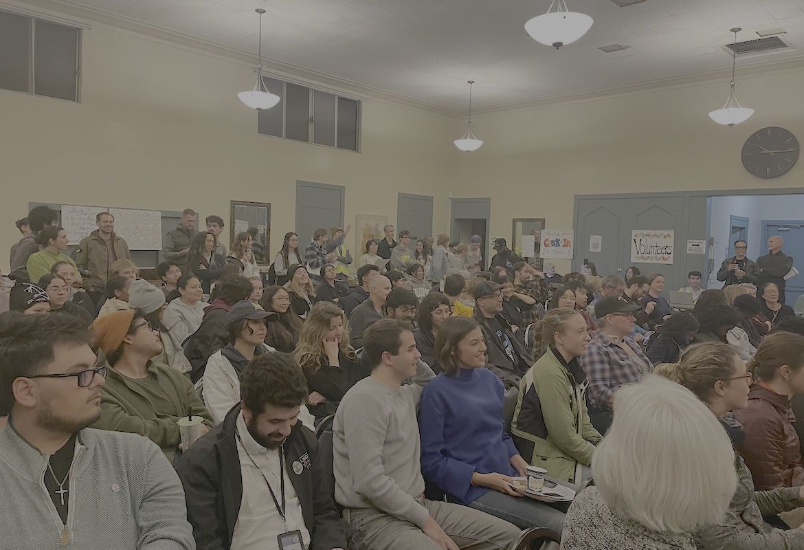 A densely packed crowd of more than 160 volunteers fills a community room at Westwood Presbyterian Church, gathered for an annual count of unhoused people in the Westwood neighborhood.