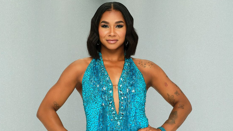 A portrait of Jordan Chiles in a teal sequined gown for ABC's Dancing With the Stars.