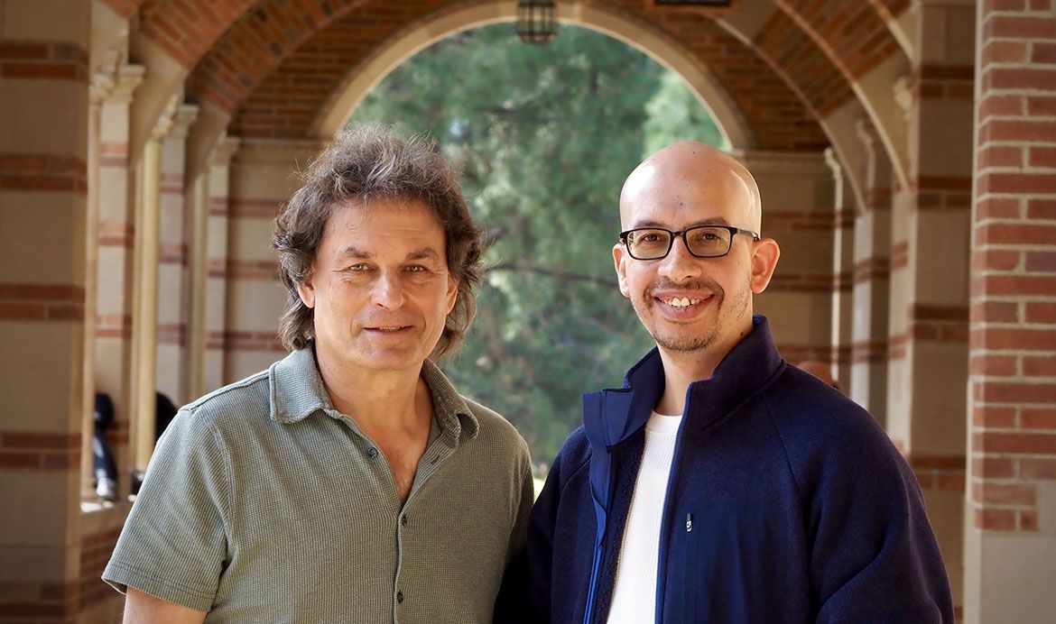 A portrait of Ric Kaner and Maher El-Kady standing together under an archway on the UCLA campus.