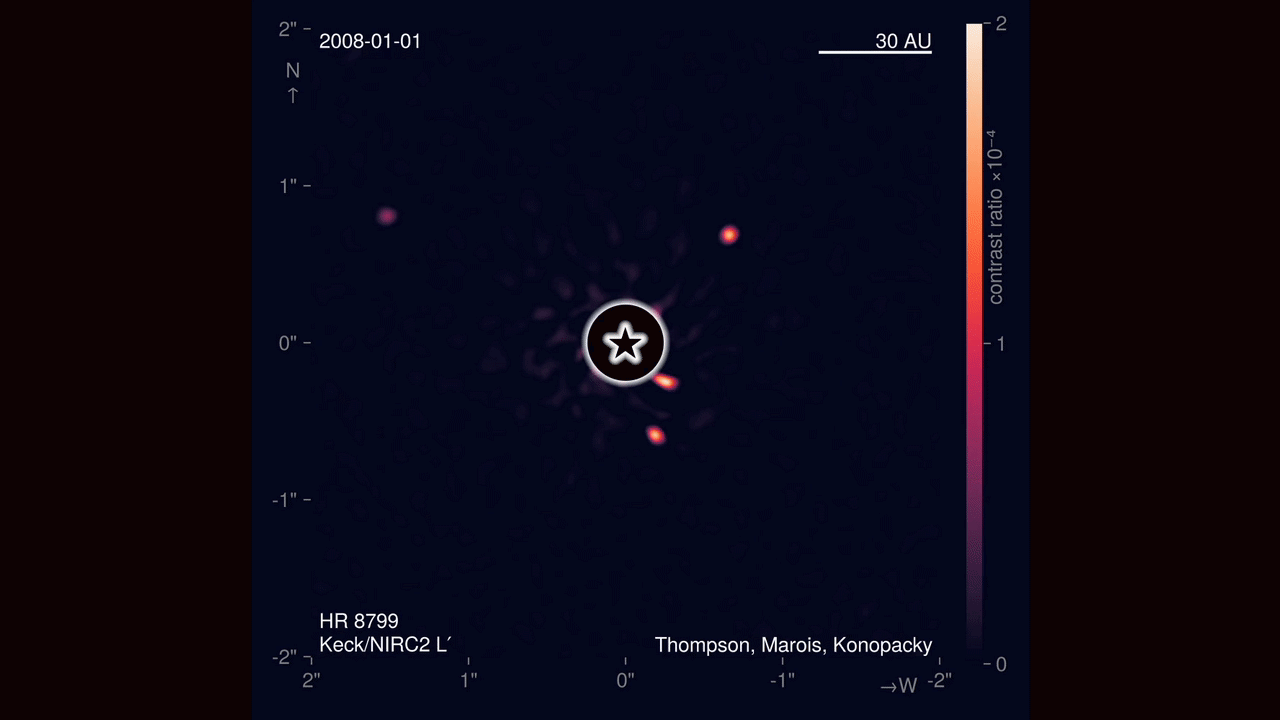 An animation made from multi-year images from the W.M. Keck Observatory showing four giant planets orbiting the star HR 8799, located 133 light-years from Earth, with orbital motion smoothed by modeling.