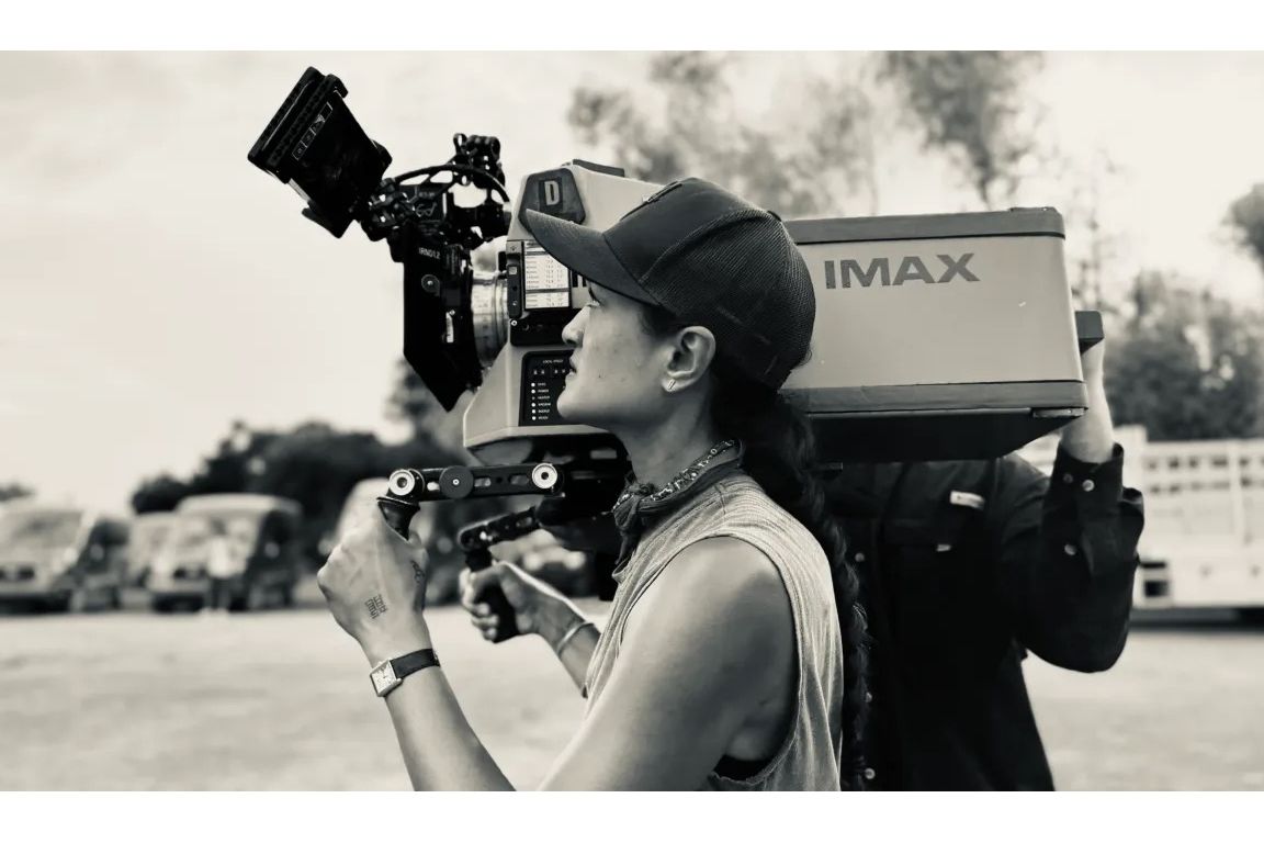 Oscar-nominated cinematographer Autumn Durald Arkapaw operates a large-format IMAX camera on the set of "Sinners." Photo by Eli Adé/IndieWire.