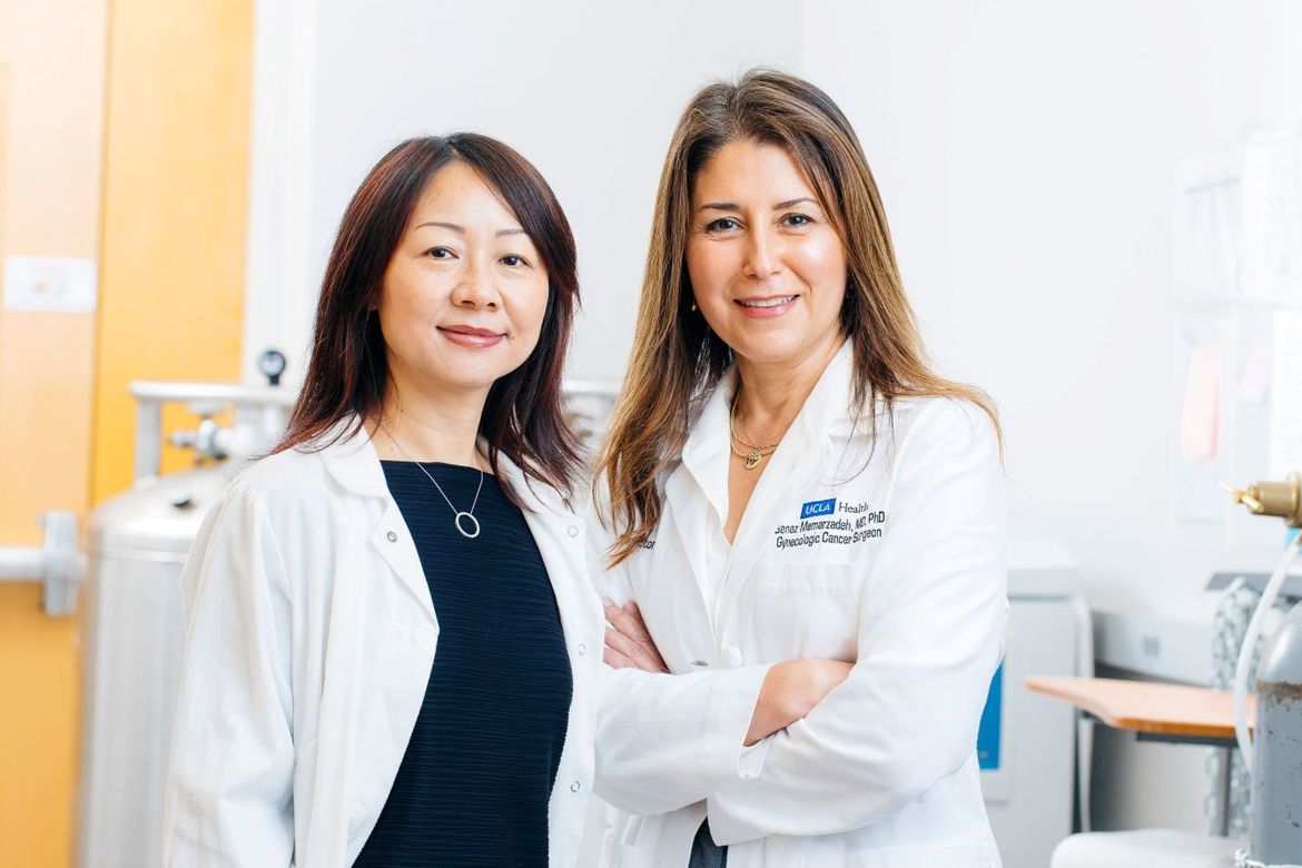 Dr. Lili Yang and Dr. Sanaz Memarzadeh in white UCLA lab coats