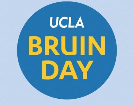 A circular blue graphic displays the text "UCLA Bruin Day" in white and gold lettering on a light blue background.
