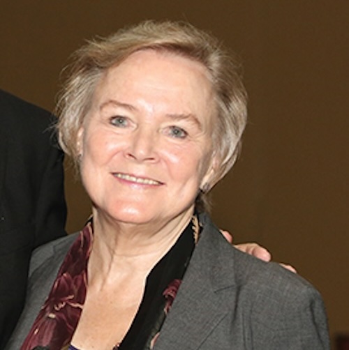 Close-up of Elizabeth Ligon Bjork, with short gray hair and a warm smile