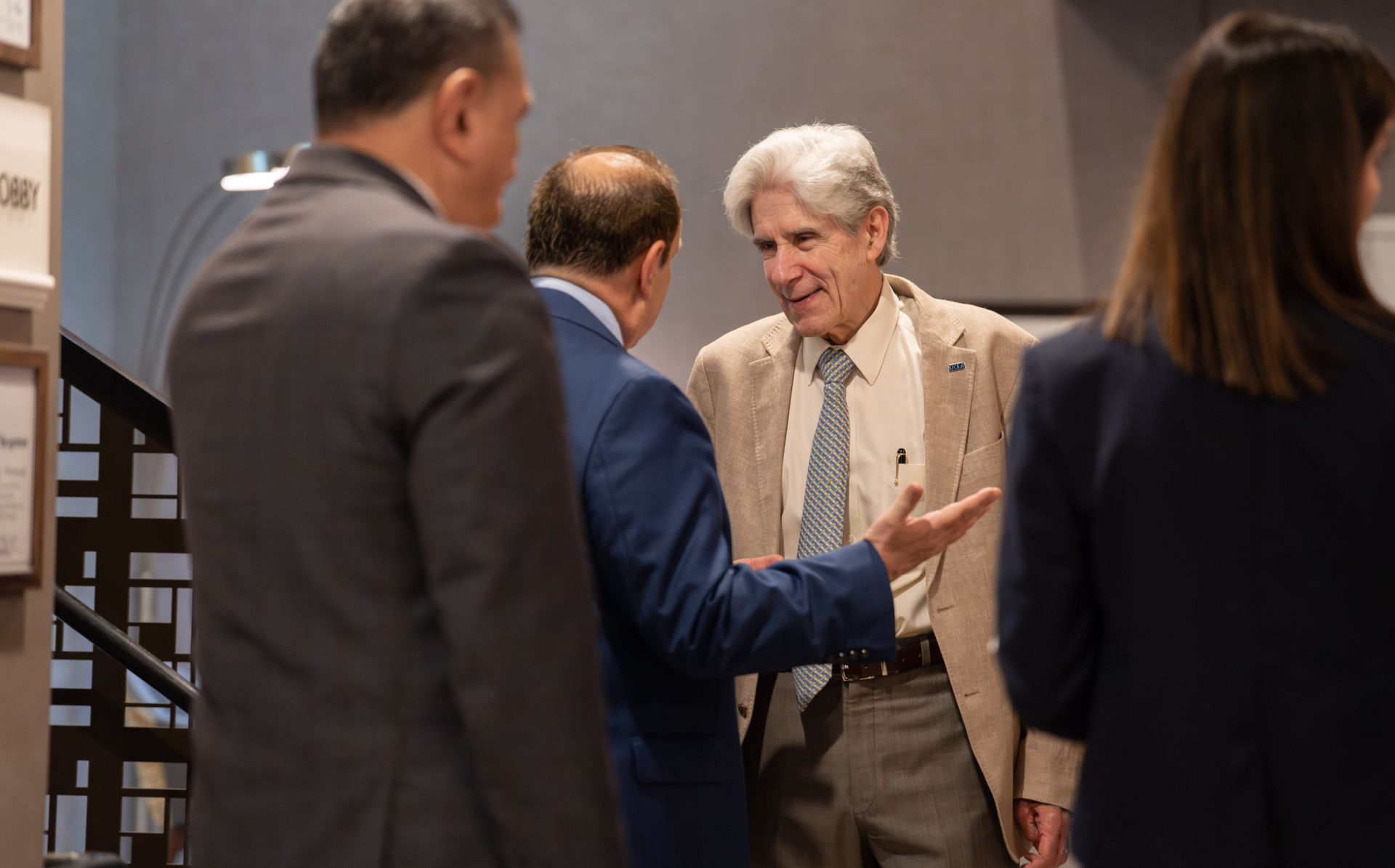 UCLA Chancellor Julio Frenk speaks with attendees during a community gathering at Belmont Village in Westwood.