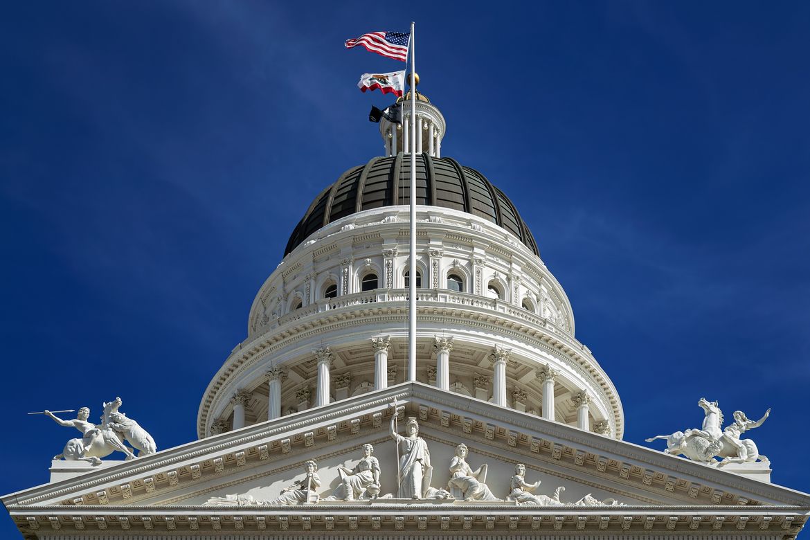California State Capitol dome against a daytime blue sky