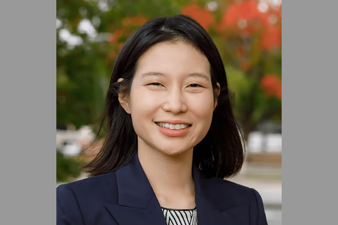 Headshot of Olivia Jung in dark blue jacket