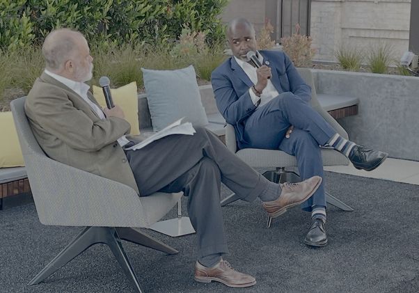 UCLA's Jim Newton interviews Los Angeles City Council President Marqueece Harris-Dawson on the rooftop of UCLA Downtown during Blueprint magazine's 10th anniversary conversation on civic issues.