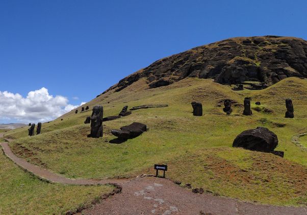 A large number of moai on the south side of Rano Raraku on Easter Island, some half-buried, some left 